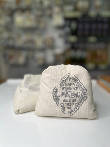 بسته پودر حنای اتابک اصل برای رنگ مو طبیعی و تقویت فولیکول مو